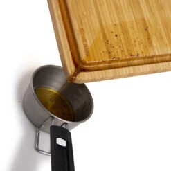 Broil King Baron 15-Inch By 10-Inch Bamboo Cutting And Serving Board 5 Broil King Baron 15-Inch By 10-Inch Bamboo Cutting And Serving Board -BBQ Haven Shop Broil King Baron 15 Inch by 10 Inch Bamboo Cutting and Serving Board BK 68428 action 01