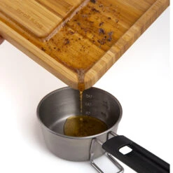 Broil King Imperial 17-Inch By 12-Inch Bamboo Cutting And Serving Board -BBQ Haven Shop Broil King Imperial 17 Inch by 12 Inch Bamboo Cutting and Serving Board BK 68429 Action 01