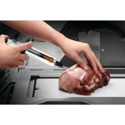 Napoleon Stainless Steel Marinade Injector 7 Napoleon Stainless Steel Marinade Injector -BBQ Haven Shop Low Res JPG 55028 MarinadeInjector SS inUse Pork