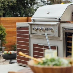 Madera By Summerset 20-Inch Stainless Steel And IPE Wood Roll-Out Trash And Recycling Bin 11 Madera By Summerset 20-Inch Stainless Steel And IPE Wood Roll-Out Trash And Recycling Bin -BBQ Haven Shop Madera by Summerset SSMTD2 20 IP 20 Inch Stainless Steel and IPE Wood Roll Out Trash and Recycling Bin Lifestyle Close