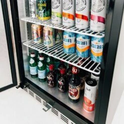 Summerset Grills 24-Inch 5.3 Cu. Ft. Capacity Outdoor Rated Refrigerator With Locking Door & Towel Bar Handle - Left Hinge -BBQ Haven Shop Summerset Grills SSRFR 24SR 24 Inch 5 3 Cu Ft Capacity Stainless Steel Outdoor Rated Refrigerator with Locking Door Towel Bar Handle Left Hinge Bottom Shelf Detail