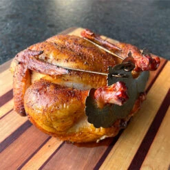 Turbo Trusser For Whole Chicken - Truss Poultry In Ovens, BBQ Smokers, BBQ Grills, Roasters, Rotisserie Kits, And Deep Fryers -BBQ Haven Shop Turbo Trusser for Whole Chicken Truss Poultry in Ovens BBQ Smokers BBQ Grills Roasters Rotisserie Kits and Deep Fryers Lifestyle 1