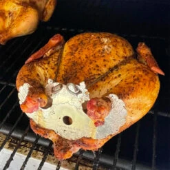 Turbo Trusser For Whole Chicken - Truss Poultry In Ovens, BBQ Smokers, BBQ Grills, Roasters, Rotisserie Kits, And Deep Fryers -BBQ Haven Shop Turbo Trusser for Whole Chicken Truss Poultry in Ovens BBQ Smokers BBQ Grills Roasters Rotisserie Kits and Deep Fryers Lifestyle 3